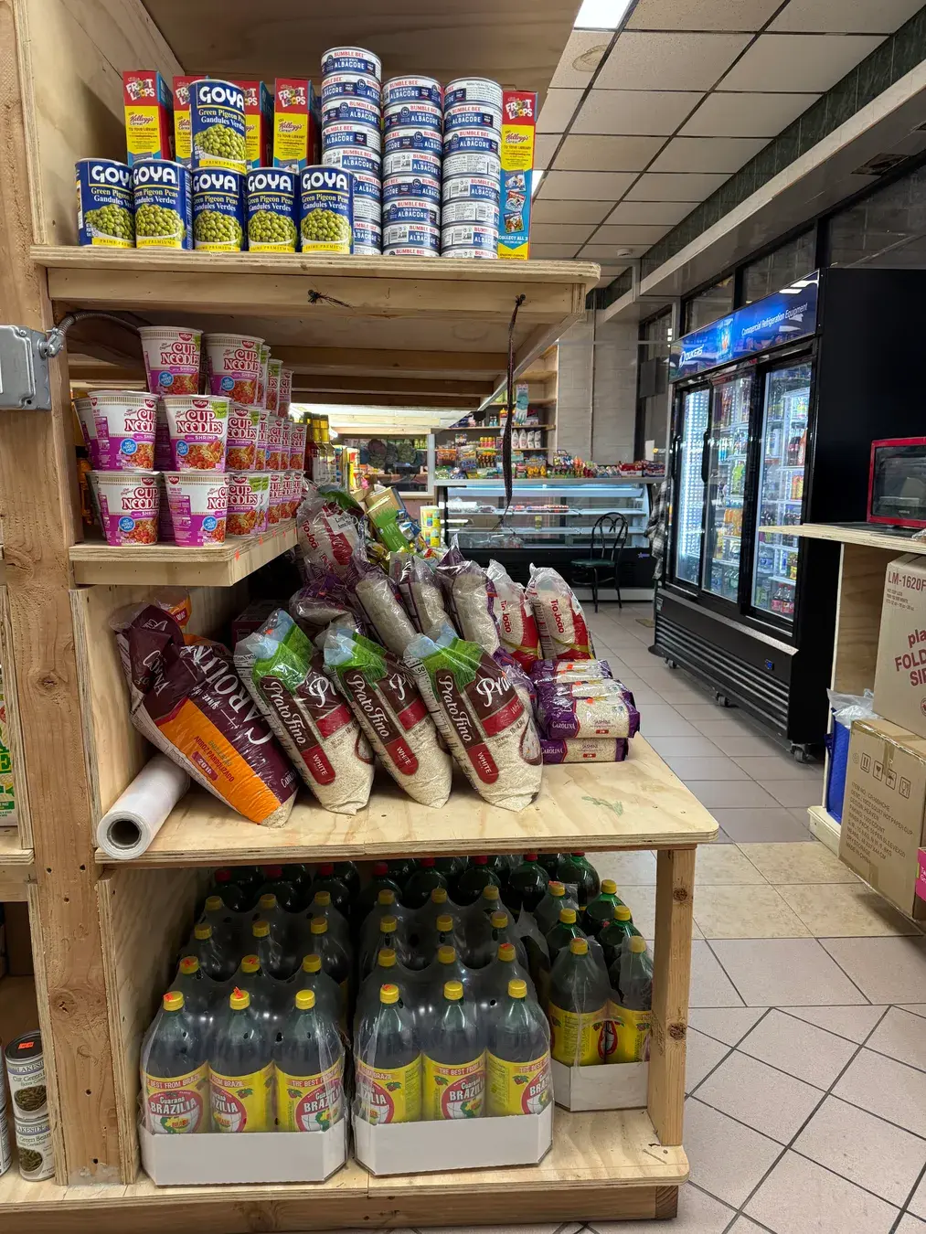 Grocery shelves stocked at Mercado La Riqueza